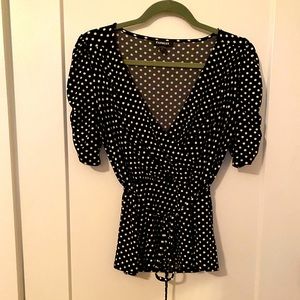 Very sexy plunging v neck line black & white polka dot blouse! Express Sz Sm Pet